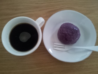 ���߂���